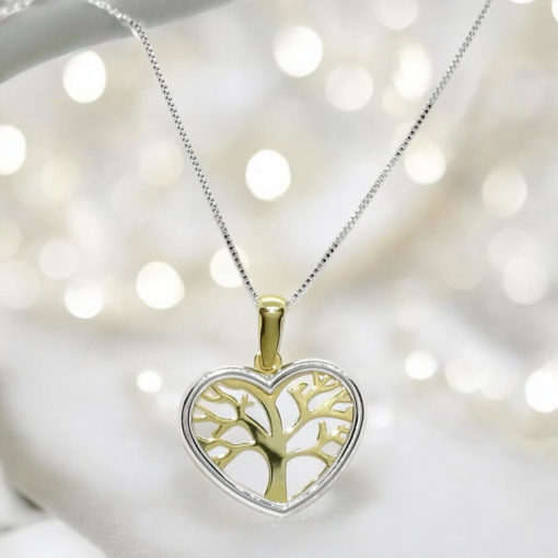 Collar de oro amarillo de 18k y oro blanco de 18k con forma de corazón y árbol de la vida. Especial mamá. Regalo especial de todo corazón.