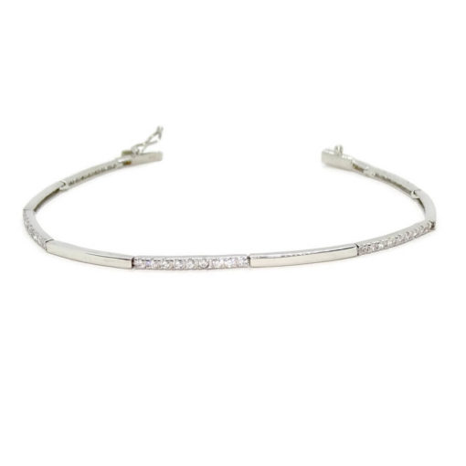 Pulsera de oro blanco de 18k para mujer de eslabones rígidos con 45 circonitas. Tamaño, 18.00 cm larga.